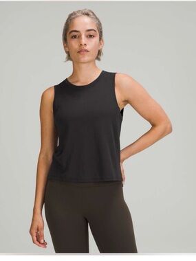 Lululemon Athletica Train to Be Tank Top
High-Low Hem Size Small